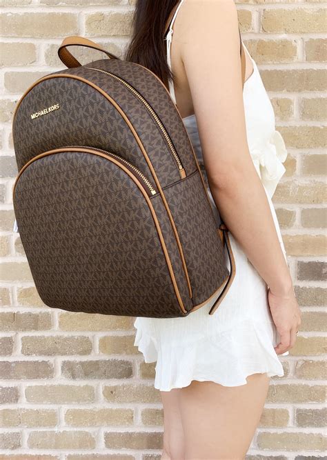 michael kors bags white and brown|Michael Kors brown leather backpack.